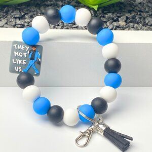 They Not Like Us" Beaded Wristlet